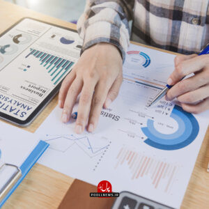 Businesswoman using a tablet to analysis graph company finance s
